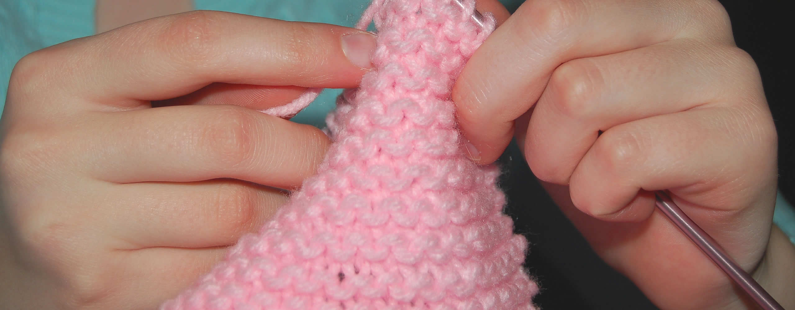 Close up of hands knitting